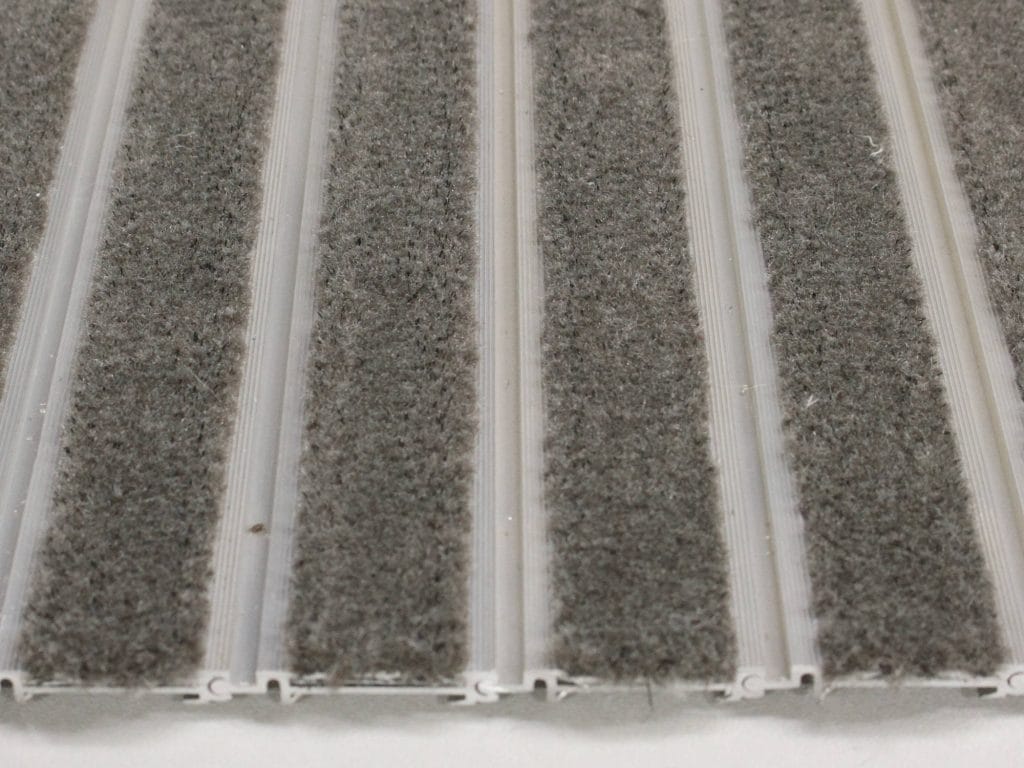 Modèle Insertion de tapis "Maxi-tuft" Modèle Insertion de tapis "Maxi-tuft"